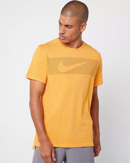 yellow orange nike shirt