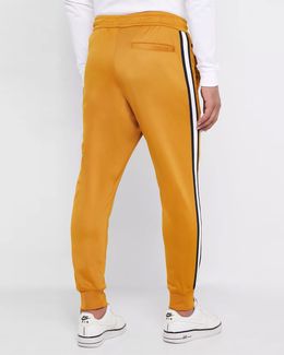 mustard yellow nike sweatpants